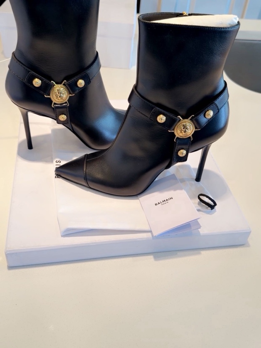 Balmain Black Leather Stiletto Ankle Boots with Gold Medallion